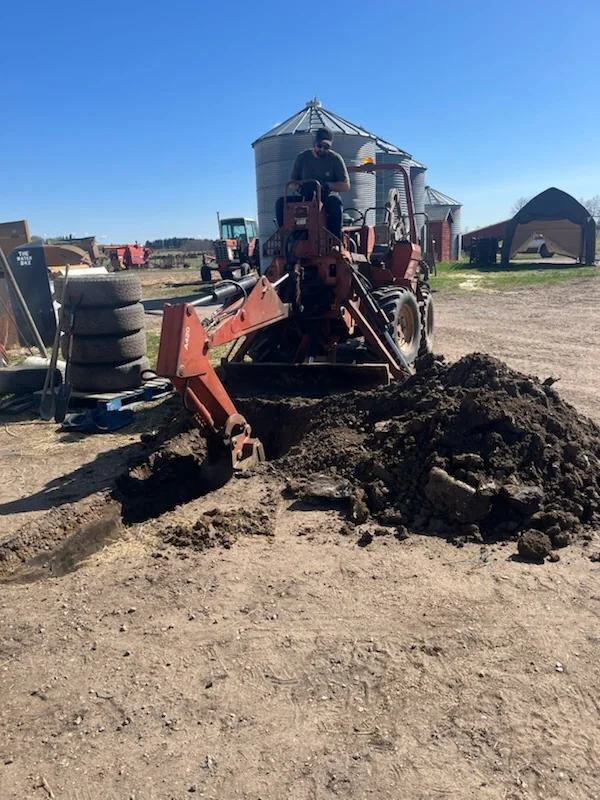 Trenching equipment creating a long electrical service trench
