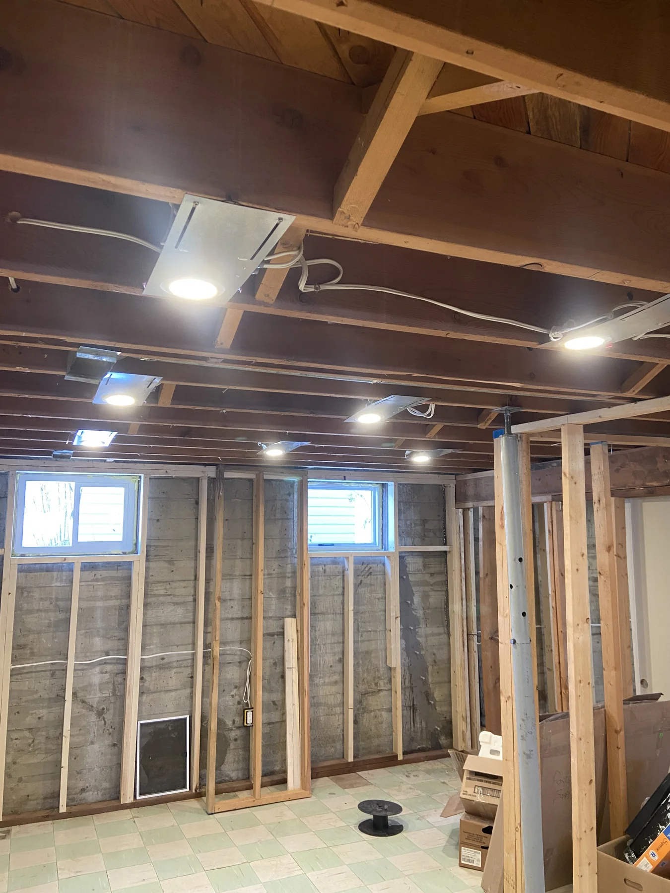 Recessed lighting operating during a home renovation