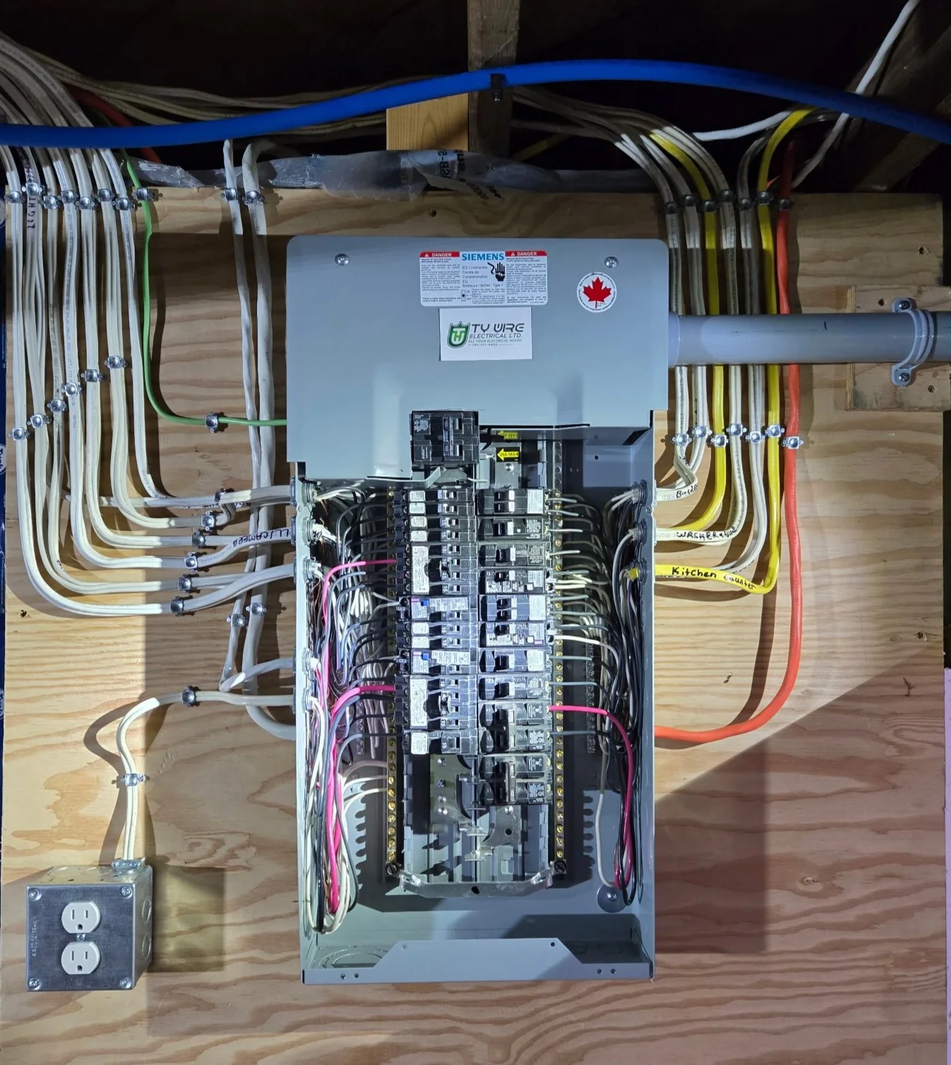 Organized residential electrical panel with labelled circuits