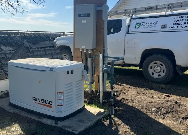 Completed standby generator installation beside a rural property
